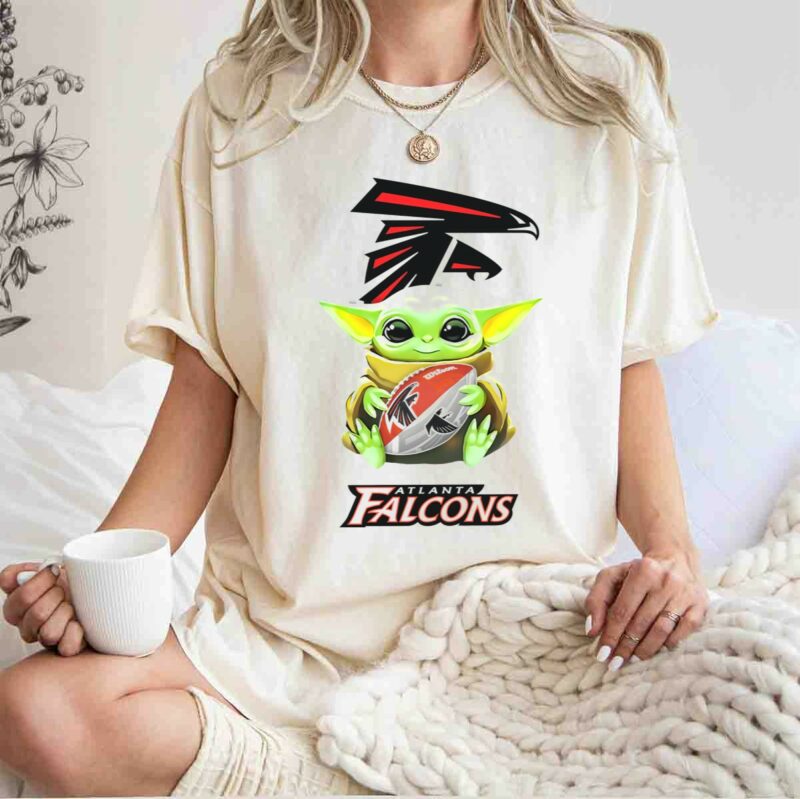 star wars baby yoda holding atlanta falcons football logo white tailgate t shirt t shirt 1 1