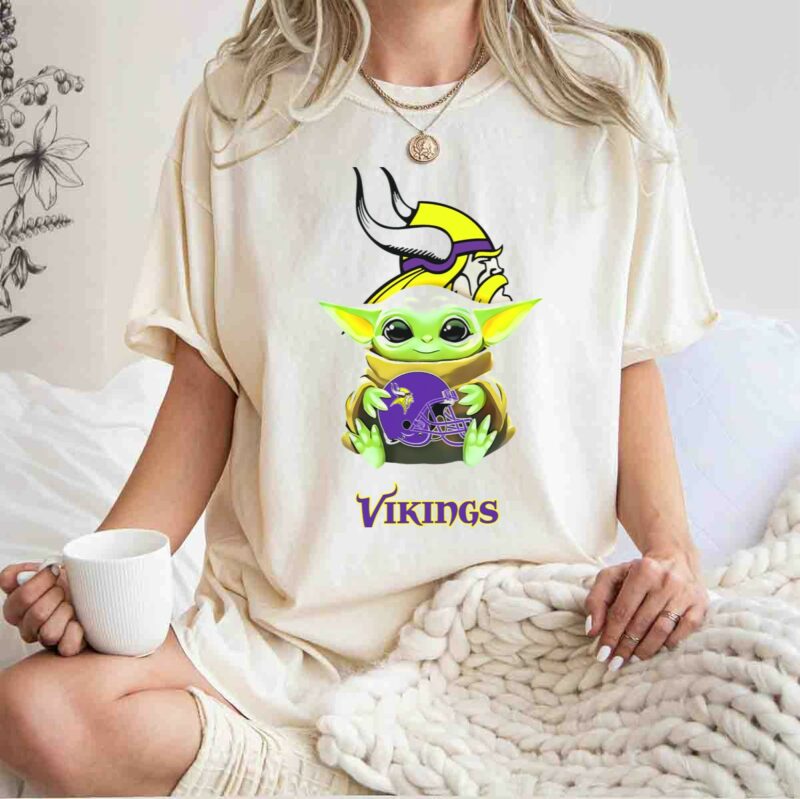 star wars baby yoda holding minnesota vikings helmet with vikings t shirt t shirt 1 1