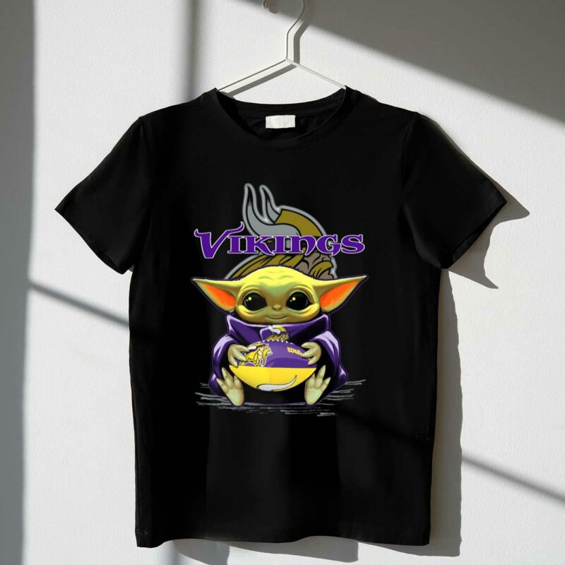 yoda holding minnesota vikings football baby yoda star wars crossover t shirt t shirt 1 1